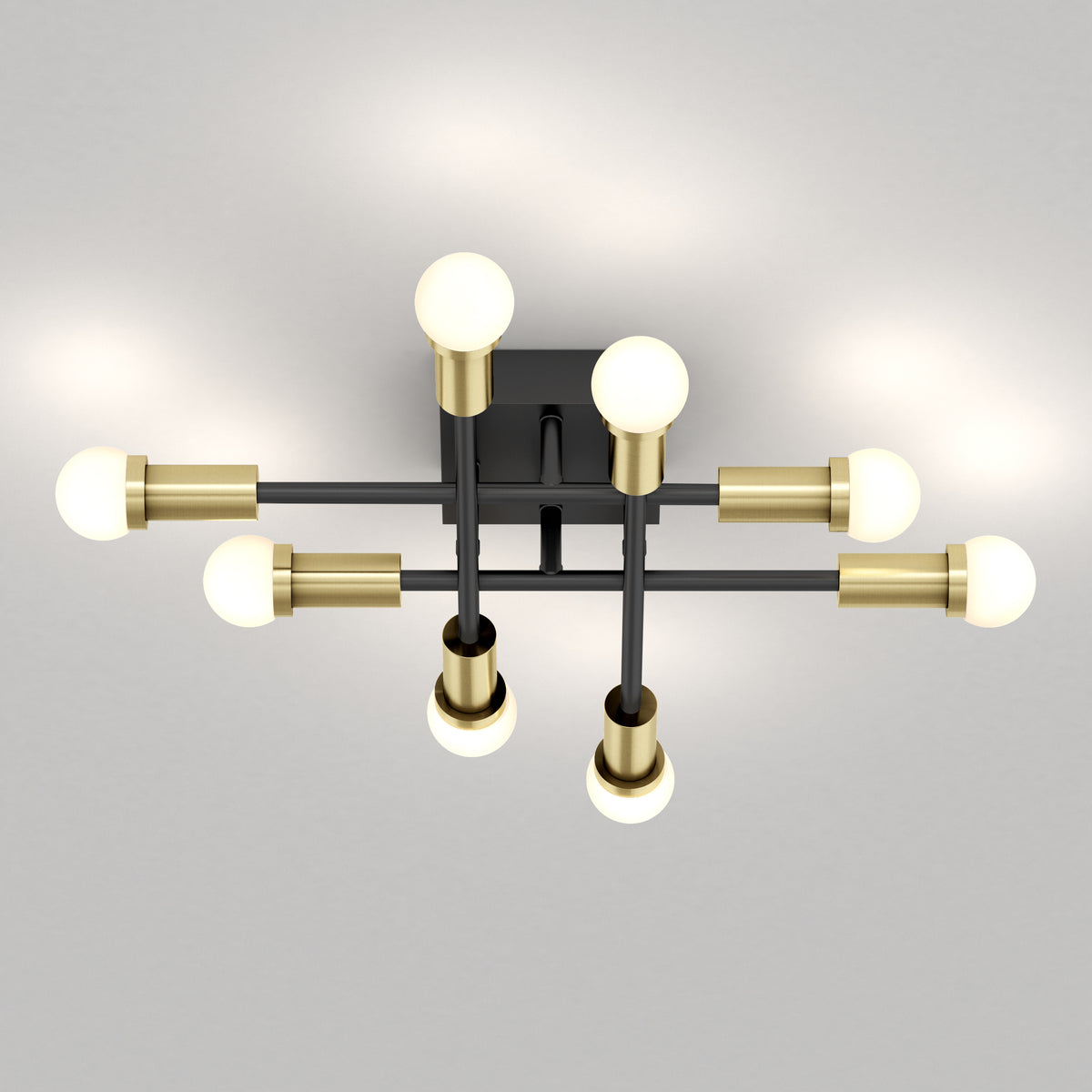 The Artika Aristo LED flush mount 3 CCT features six round bulbs on black and gold rods with adjustable color temperature.
