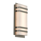 A modern wall sconce with a rectangular frosted glass shade, featuring three horizontal metallic bands and a metallic backplate, illuminated with a soft, warm light.