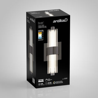 A black box for the Artika Dorado contemporary LED wall sconce 3 CCT, displaying the luxury fixture image, brightness and adjustable colour temperature icons, plus product details in English, French, and Spanish.
