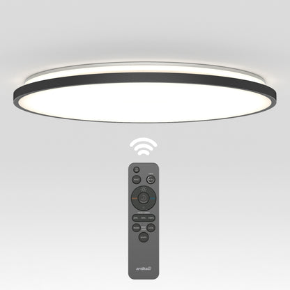 The Artika Europa 21 in. LED modern flush mount light features a black-rimmed, circular design and comes with a remote control for wireless operation, as shown illuminated above its multi-button remote.