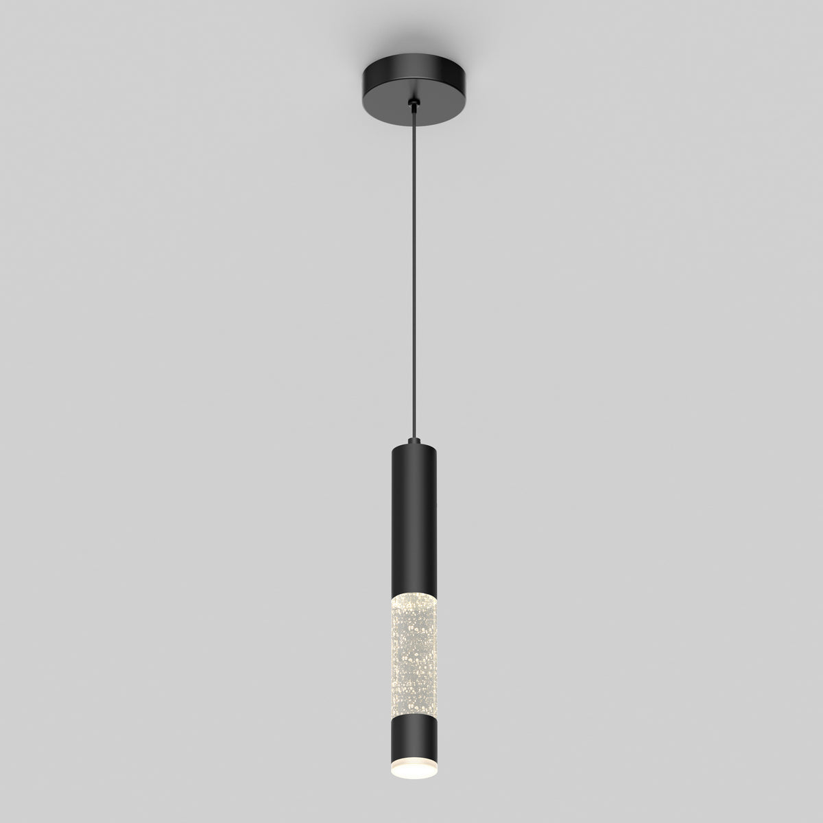The Artika Mist LED pendant light features a modern black cylindrical design with a frosted bubble-accented segment and an illuminated bottom, hanging elegantly from the ceiling.