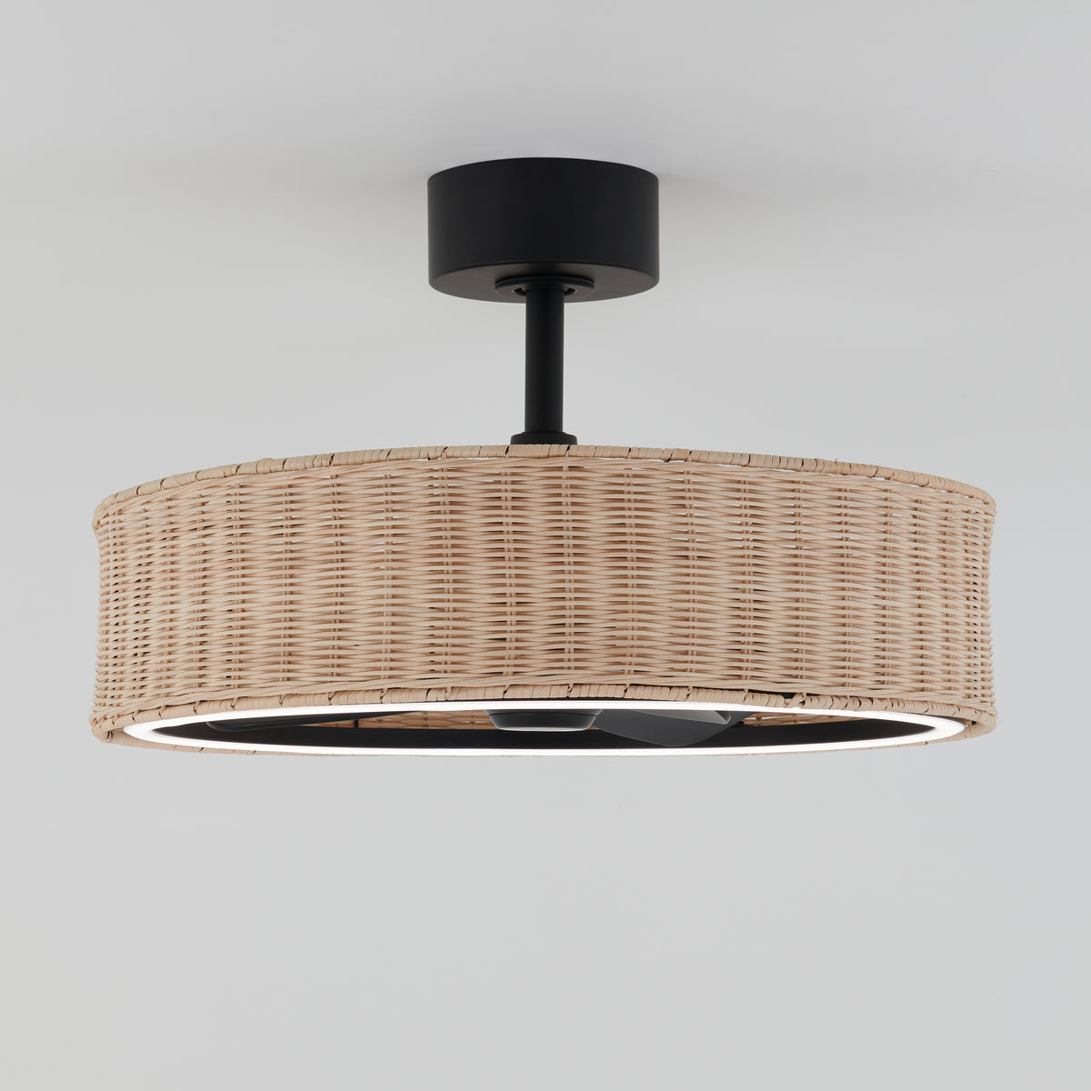 The Artika Kalani 24 in. LED modern ceiling fan features 3 speeds and a remote, with a sleek round design and black metal base, mounted on a plain white ceiling.