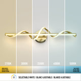 A modern wall-mounted light fixture is shown with five sections, each displaying a different white light color temperature from warm (2700K) to cool (5000K), demonstrating selectable white lighting options.