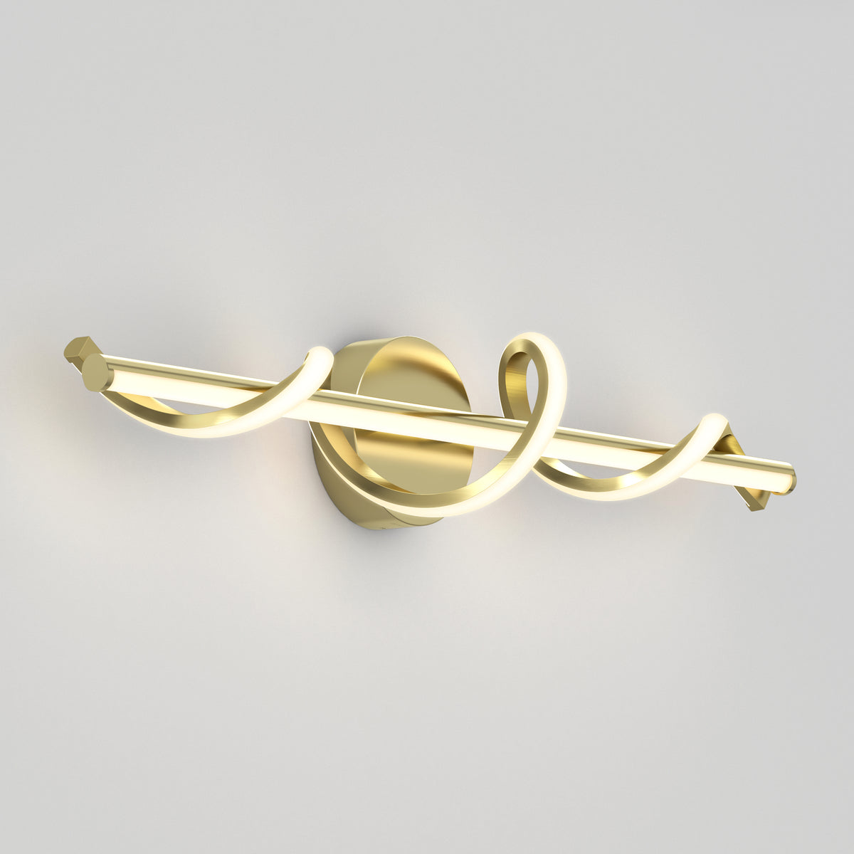 A modern wall sconce with a gold finish, featuring a central horizontal bar and two illuminated, swirling loops wrapping around it, mounted on a circular base against a white wall.