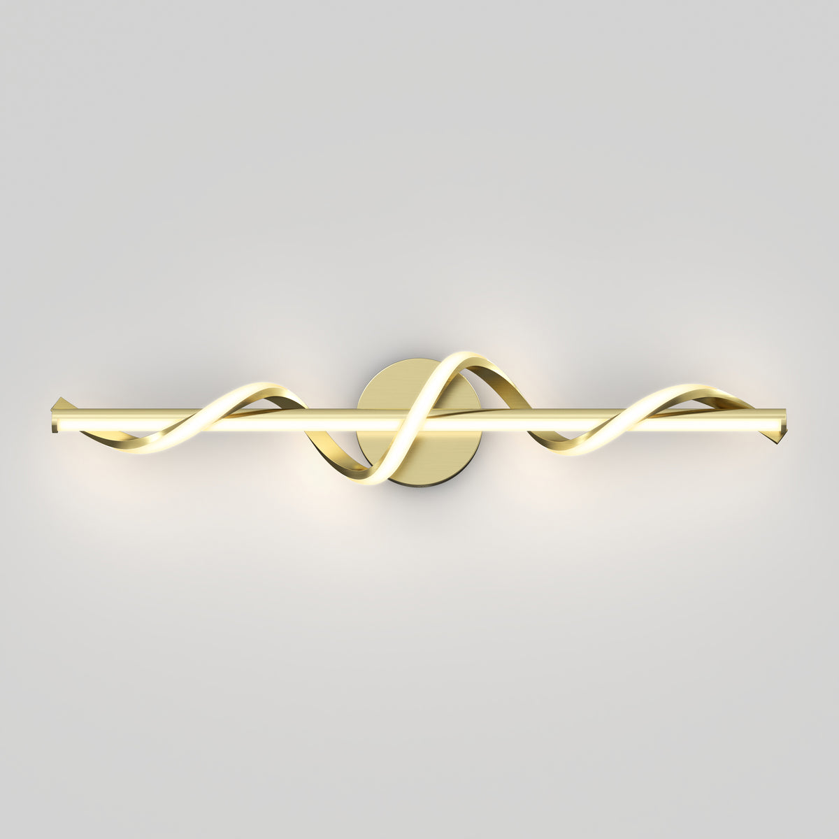 A modern wall light fixture with a gold base and two intertwined, wavy LED light bars extending horizontally, mounted on a plain light gray wall.