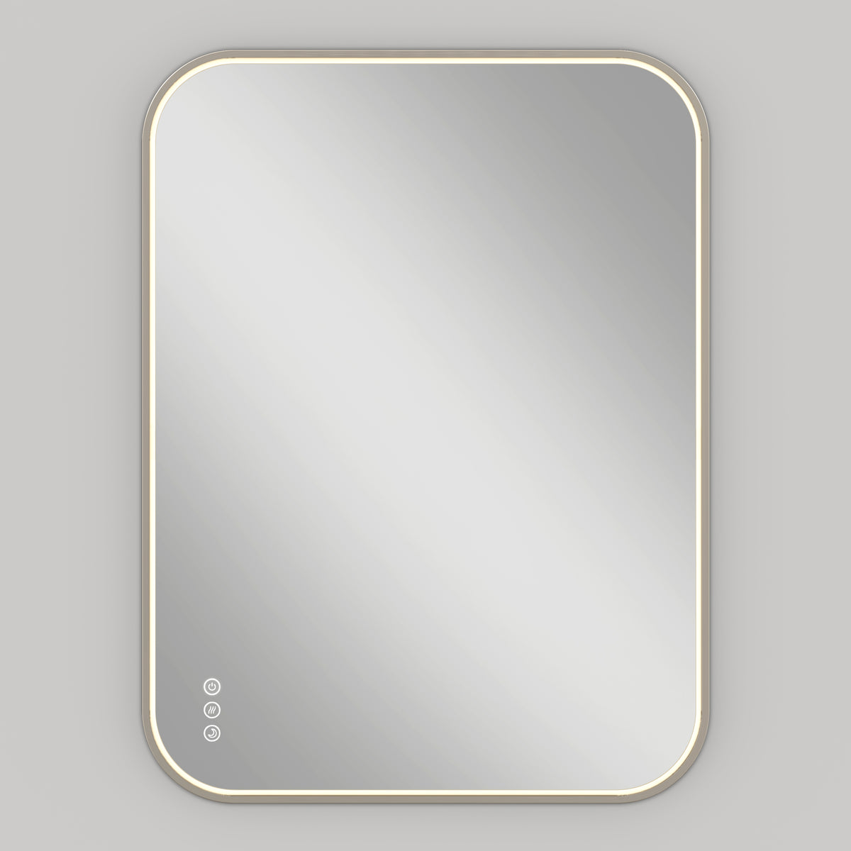 The Artika Royce Dimmable LED Mirror, 3 CCT, is shown mounted on a light gray wall. Its rectangular shape features rounded corners, a glowing LED border, and three touch buttons with adjustable color temperature at the bottom left.