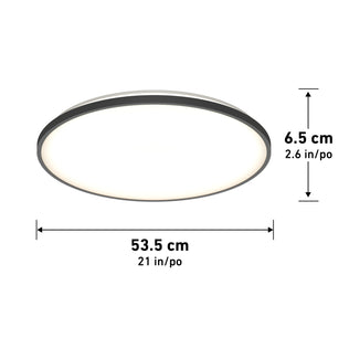 The Artika Europa 21 in. LED modern flush mount light features a round design with a diameter of 53.5 cm (21 in) and a height of 6.5 cm (2.6 in). Measurements are shown with arrows and labels in centimeters and inches. Includes remote control.