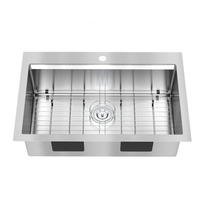 The Artika Newport single bowl stainless steel workstation sink features a rectangular shape, central drain, single pre-drilled faucet hole, removable wire rack, and two black pads on the outer sides.
