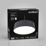 A black box displaying the Artika Groove drum LED pendant light, with an image of the modern, round, black hanging lamp on the front and product features highlighted on the packaging.
