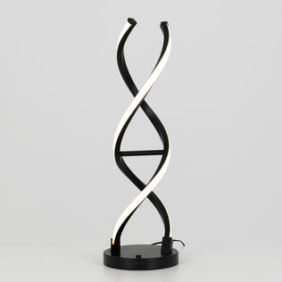 The Artika Swirl LED table lamp features two intertwined, spiral-shaped dimmable LED strips resembling a DNA double helix, set on a black and chrome base against a plain gray background.