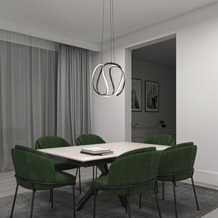 A minimalist dining room features a rectangular table, six green upholstered chairs, gray curtains, monochrome wall art, and the Artika Vivaldi Big LED pendant light for a modern touch.