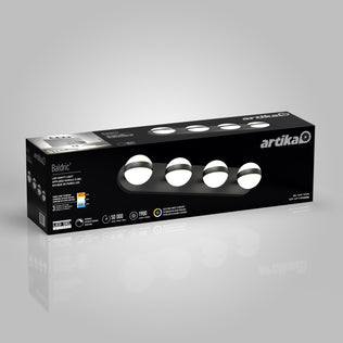 A black Artika Baldric LED modern bathroom vanity light 3 CCT with four lights is shown on a reflective gray background.