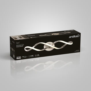 A rectangular black box displays Artika’s Swirl LED bathroom vanity light with a wave-shaped design, highlighting features like a 50,000-hour lifespan and 1800 lumens brightness.