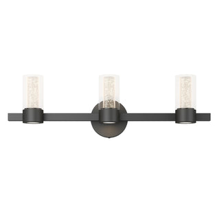 The Artika Novello modern LED bathroom vanity light has three glass shades on a matte black bar—perfect for a stylish bathroom.