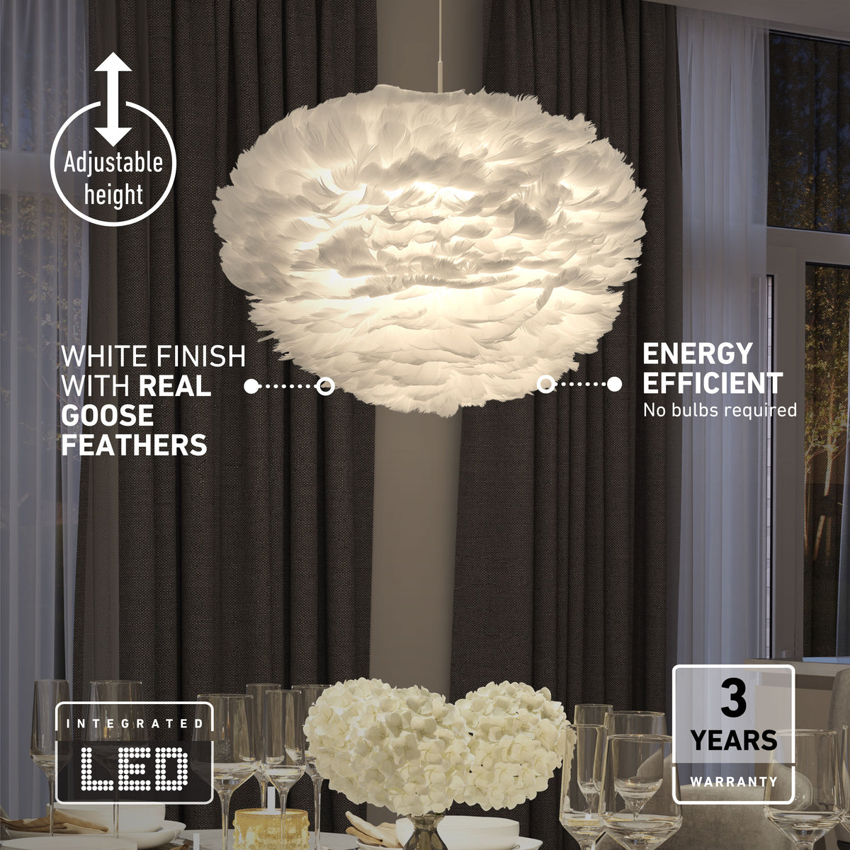 White feather chandelier hanging above a dining table with glassware and a white floral centerpiece; labeled features include adjustable height, real goose feathers, energy efficiency, integrated LED, and a 3-year warranty.