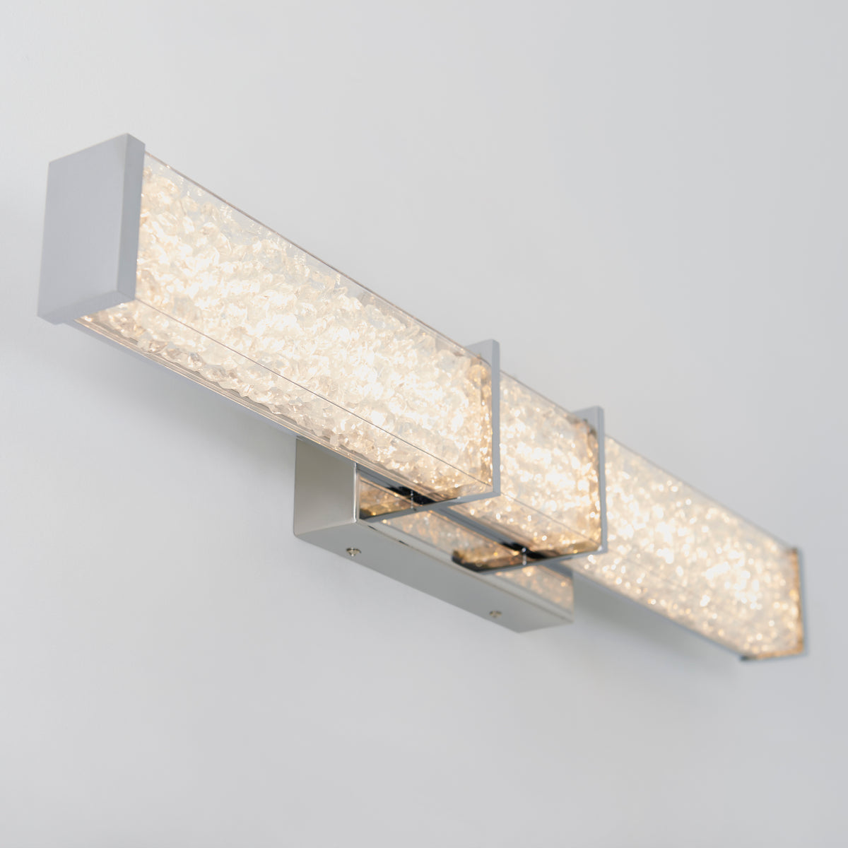 Artika Royale 27-in LED Vanity Light Bar: sleek, energy-efficient bathroom lighting with three illuminated bars and a metallic base.