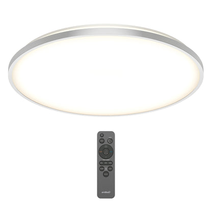 The Artika Europa 21 in. LED modern flush mount light emits a soft white glow and comes with a black remote control featuring multiple settings buttons.