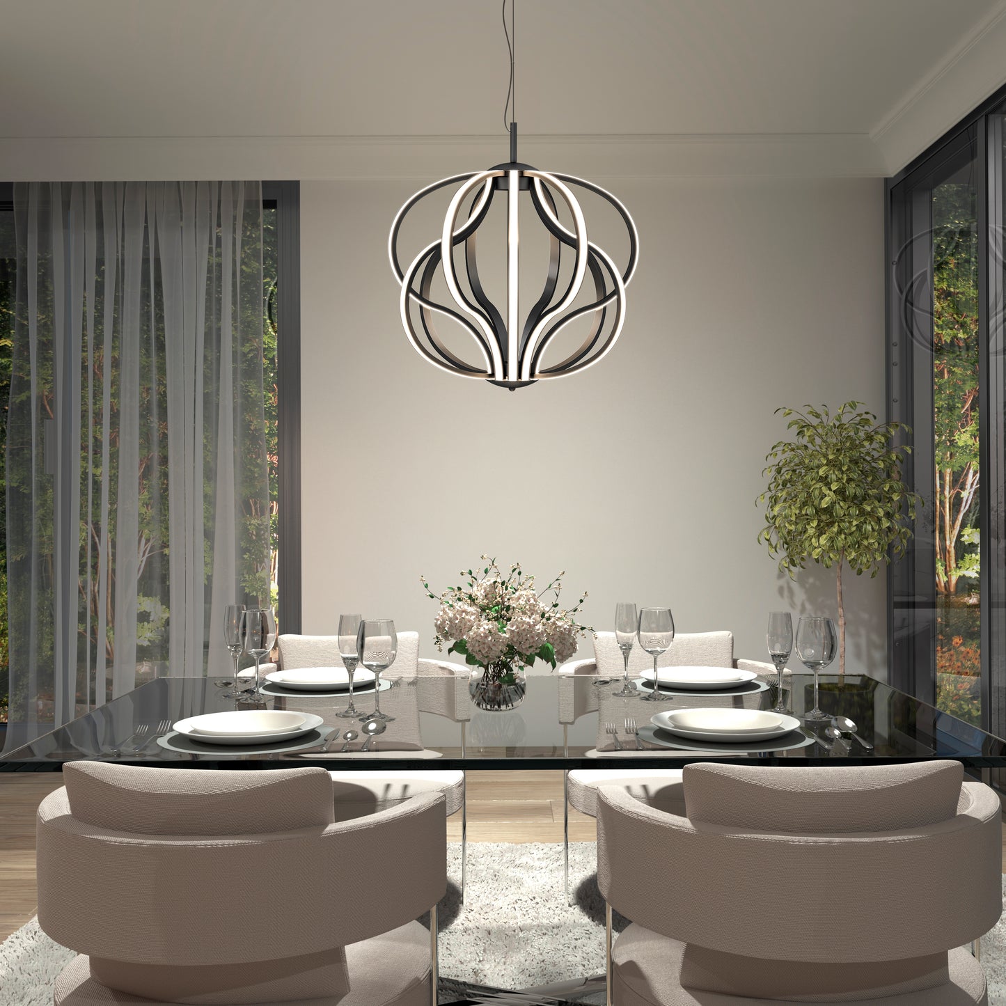A modern dining room with a glass table set for four, beige cushioned chairs, a floral centerpiece, large windows with sheer curtains, a potted plant, and the Meridian LED pendant light by Artika hanging overhead.