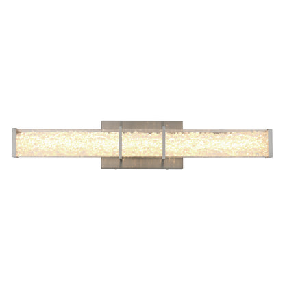 A modern wall-mounted light fixture with a rectangular, frosted glass design and a brushed metal base, emitting a bright, even glow.
