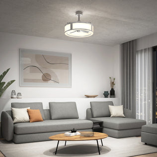 Modern living room with gray sofas, abstract art, and the Artika Huxley 23" LED ceiling fan with quiet motor and remote.