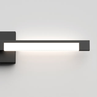 The Artika Tivoli modern LED bathroom vanity light 5 CCT features a sleek rectangular design with a black base, mounts on the wall, and offers adjustable lighting for personalized ambiance against any plain white wall.