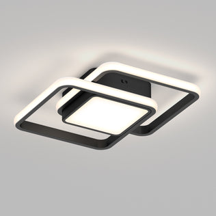 The Romeson 11 in. LED modern flush mount light by Artika features two overlapping black and white geometric frames with a glowing center panel, creating a stylish look on any white ceiling.