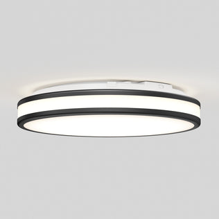 Artika Hemisphere 15″ Modern LED Flush Mount with 5 CCT, white diffuser, black rings, on plain white ceiling.