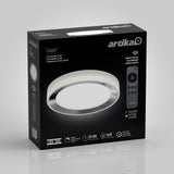 Black and gray box for an Artika Cooper LED ceiling light, featuring an image of the circular light fixture and a remote control on the front. Text highlights brightness, lifespan, and remote control features.