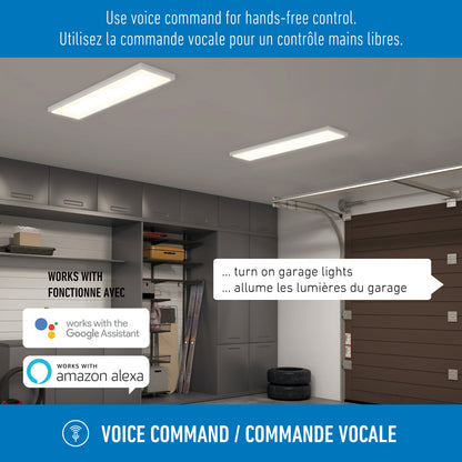 A modern garage with Artika Skyshade smart RGB LED light panels and storage cabinets, showing Google Assistant and Alexa icons. Text bubbles display voice commands to turn on the garage lights in English and French.