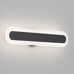 The Artika Pista modern LED bathroom vanity light 5 CCT features an oval matte black design with a glowing white border and sleek black center, offering soft, even LED light—perfect for contemporary bathrooms or vanities.
