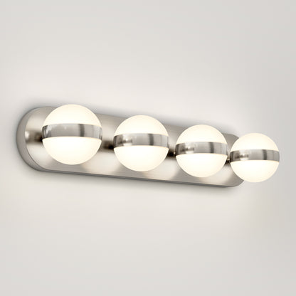A modern wall-mounted light fixture with four round frosted glass globes, each partially encircled by a brushed metal band, attached to a rectangular metal base.