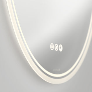 The Artika Corby 22 in. x 28 in. LED Mirror features touch controls for light and defogger, emitting a soft white glow along its edge for modern bathroom style.