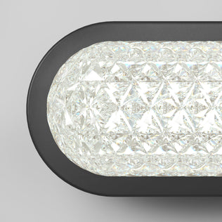 Close-up of the Artika Carat LED contemporary bathroom vanity light 3 CCT with a black frame on a light gray wall.