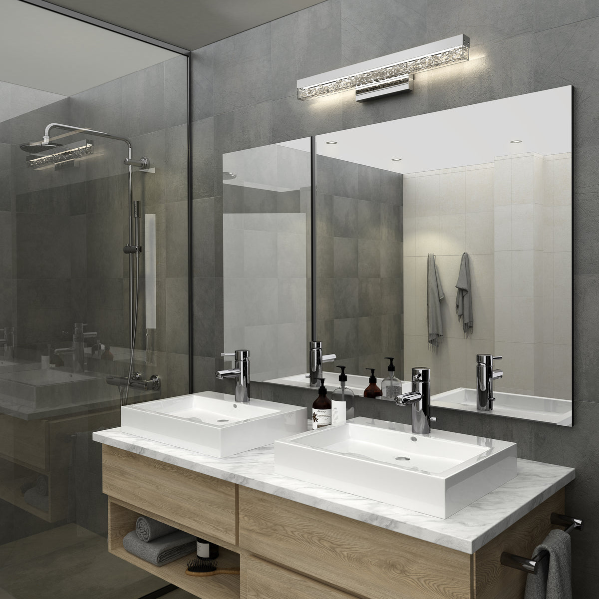 Modern bathroom with double sinks, marble countertop, wood cabinets, and Artika Riviera modern LED vanity light above the mirror.