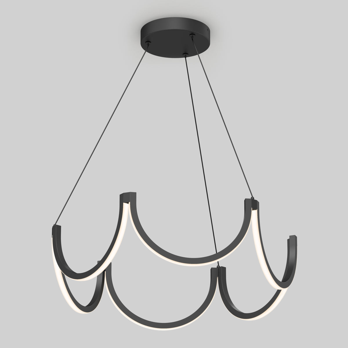 The Adelia LED pendant light by Artika features three modern, wave-like black arms with integrated white LED strips, suspended by thin black cables from a round ceiling mount. Adjustable with 5 CCT settings for versatile lighting.