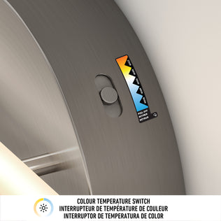Close-up of the Artika Cisco modern LED bathroom vanity light 5 CCT, showing a brushed metal finish and adjustable colour temperature switch (warm to cool). Trilingual label reads Colour Temperature Switch—ideal for bathroom lighting.