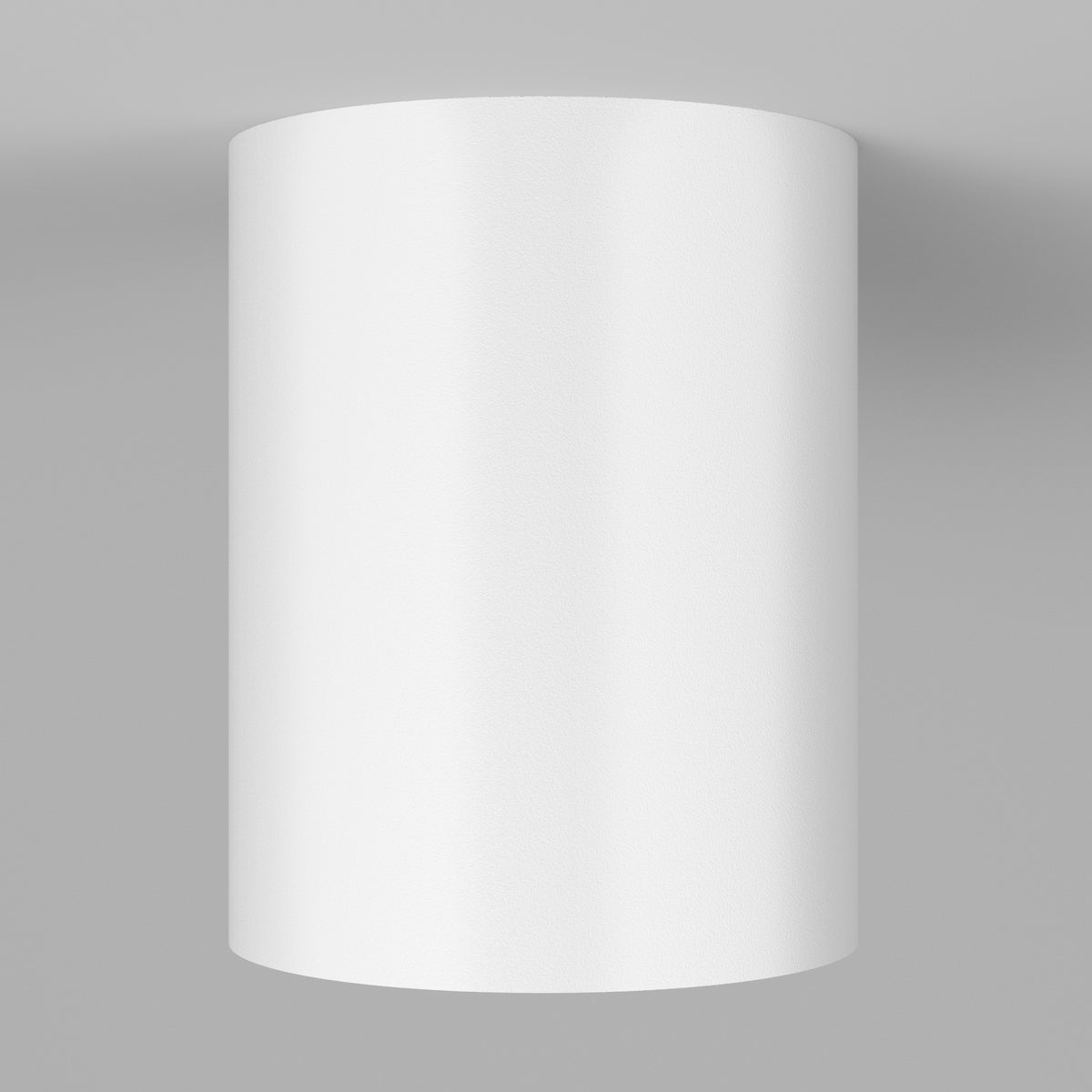 A plain white cylindrical object with a smooth surface is centered against a light gray background. The cylinder appears to be solid and featureless.
