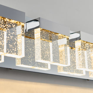 Artika Bubble Cube 4-light LED vanity features chrome accents, glass blocks with bubbles, and modern style.