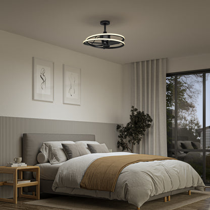 A modern bedroom features a neatly made bed with neutral bedding and tan blanket, a nightstand with lamp, abstract wall art, potted plant, large curtained window, and an Artika Coda 23 in. LED modern ceiling fan with remote overhead.
