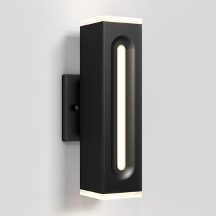 The Artika Linea Square LED indoor-outdoor wall light 3 CCT is a modern black sconce with rounded edges, a vertical center light strip, and lit top and bottom edges, mounted on a light gray wall.