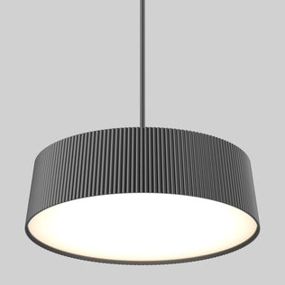 The Artika Groove Drum LED contemporary pendant light features a wide, cylindrical, dark gray ribbed shade and 3 CCT options, hanging from the ceiling and casting a bright, even glow against a plain gray background.