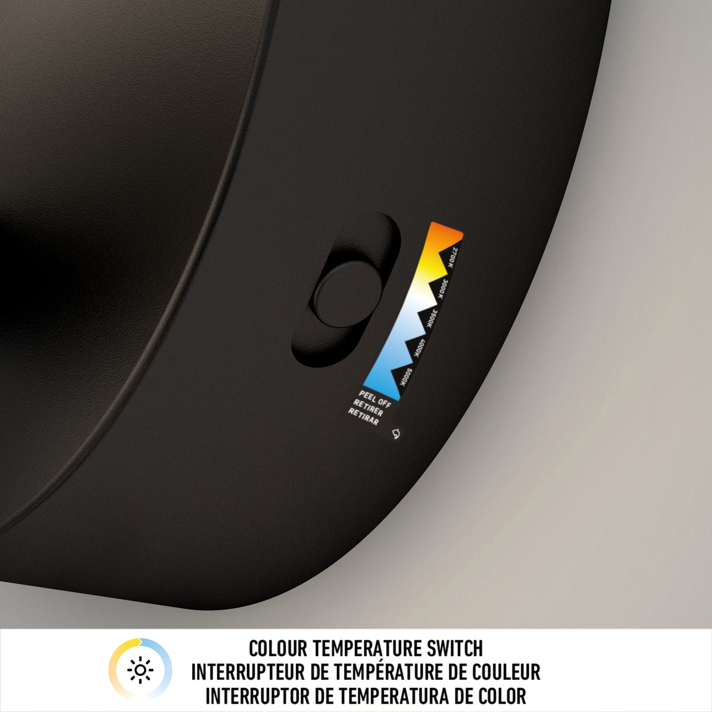 Close-up of the Artika Chorus LED Wall Light in black, featuring a color temperature switch with sliding button and scale from warm to cool. Below, “COLOUR TEMPERATURE SWITCH” appears in English and two other languages.