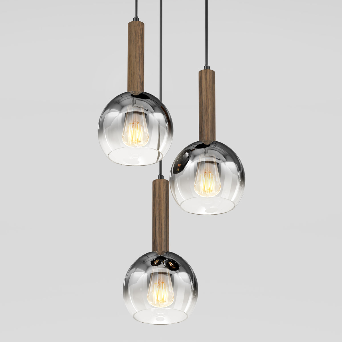 The Artika Ardel Spiral 3-Light Pendant is shown hanging at varying heights against a white background. Each fixture features clear glass globes with wooden accents. Bulbs are not included.