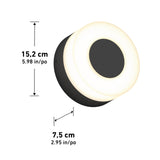A round black wall light with a glowing white ring, measuring 15.2 cm (5.98 in) in diameter and 7.5 cm (2.95 in) in depth. Measurement arrows are shown for both dimensions.