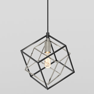 The Imperium Single pendant light by Artika features an exposed bulb within an open, geometric black metal cube frame and hangs from a black cord, set against a plain light gray background.