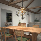 A modern dining room features a wooden table with four chairs, a geometric pendant light above, exposed ceiling beams, a gray sofa, and a window showing a nighttime view. A sideboard and decorative plant are in the background.