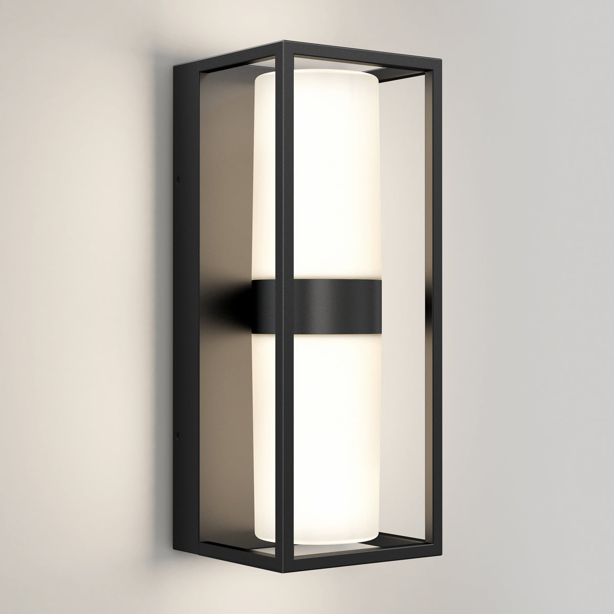 The Artika Sherman modern LED indoor-outdoor wall light 5 CCT features a rectangular black metal frame with a cylindrical white frosted glass, shown mounted on a plain light-colored wall.