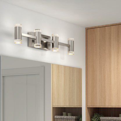 A modern bathroom features the Artika Mist modern LED bathroom vanity light 5 CCT above a large mirror, with wooden cabinets and decorative storage baskets below.
