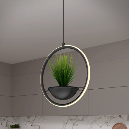 The Artika Colin LED modern planter pendant light 5 CCT features a circular LED frame and black pot with green artificial grass, hanging in a minimalist kitchen with gray cabinets and a marble backsplash.