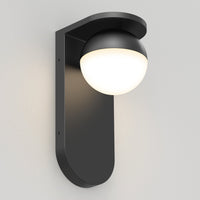 The Artika Bloom indoor-outdoor LED wall light 3 CCT features a modern matte black rectangular base and a dome-shaped white cover that softly glows, perfect for contemporary settings.